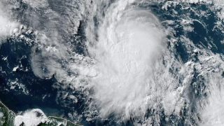 This National Oceanic and Atmospheric Administration (NOAA)/GOES satellite handout image shows Tropical Storm Beryl at 19:30UTC on June 29, 2024. Much of the southeast Caribbean went on alert Saturday as Tropical Storm Beryl was set to undergo rapid strengthening, becoming a "dangerous" major hurricane before it crosses the Windward Islands sometimes on June 30, forecasters said.
Barbados, St Lucia, St Vincent and the Grenadines and Grenada all had hurricane watches in place, the US National Hurricane Center said, as Beryl swirled in the Atlantic. (Photo by HANDOUT / NOAA/GOES / AFP) / RESTRICTED TO EDITORIAL USE - MANDATORY CREDIT "AFP PHOTO /NOAA/GOES" - NO MARKETING NO ADVERTISING CAMPAIGNS - DISTRIBUTED AS A SERVICE TO CLIENTS